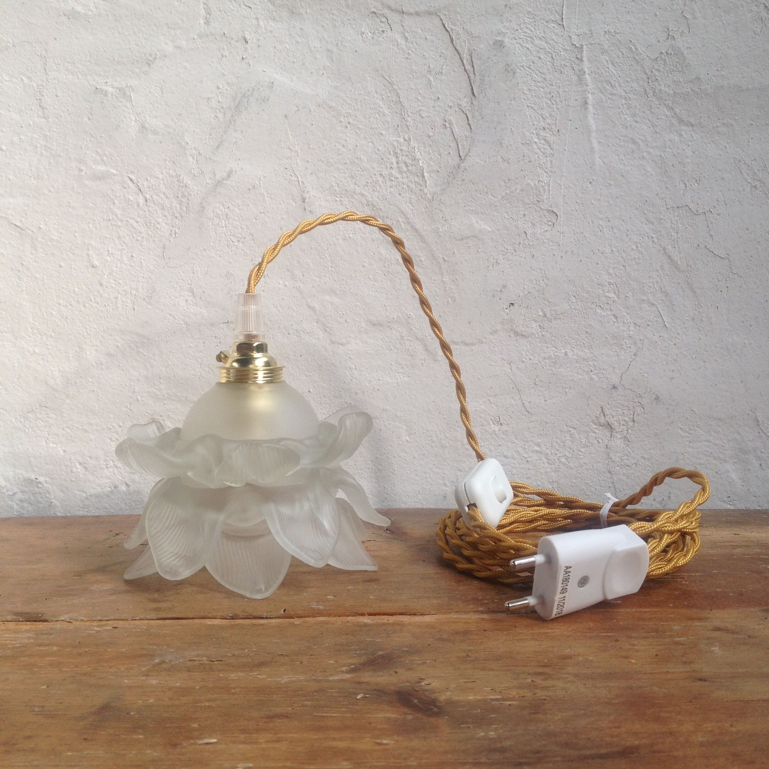 Pink glass hand lamp