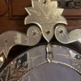 Oval Venetian mirror with close-bezel, early 20th century, flower decoration