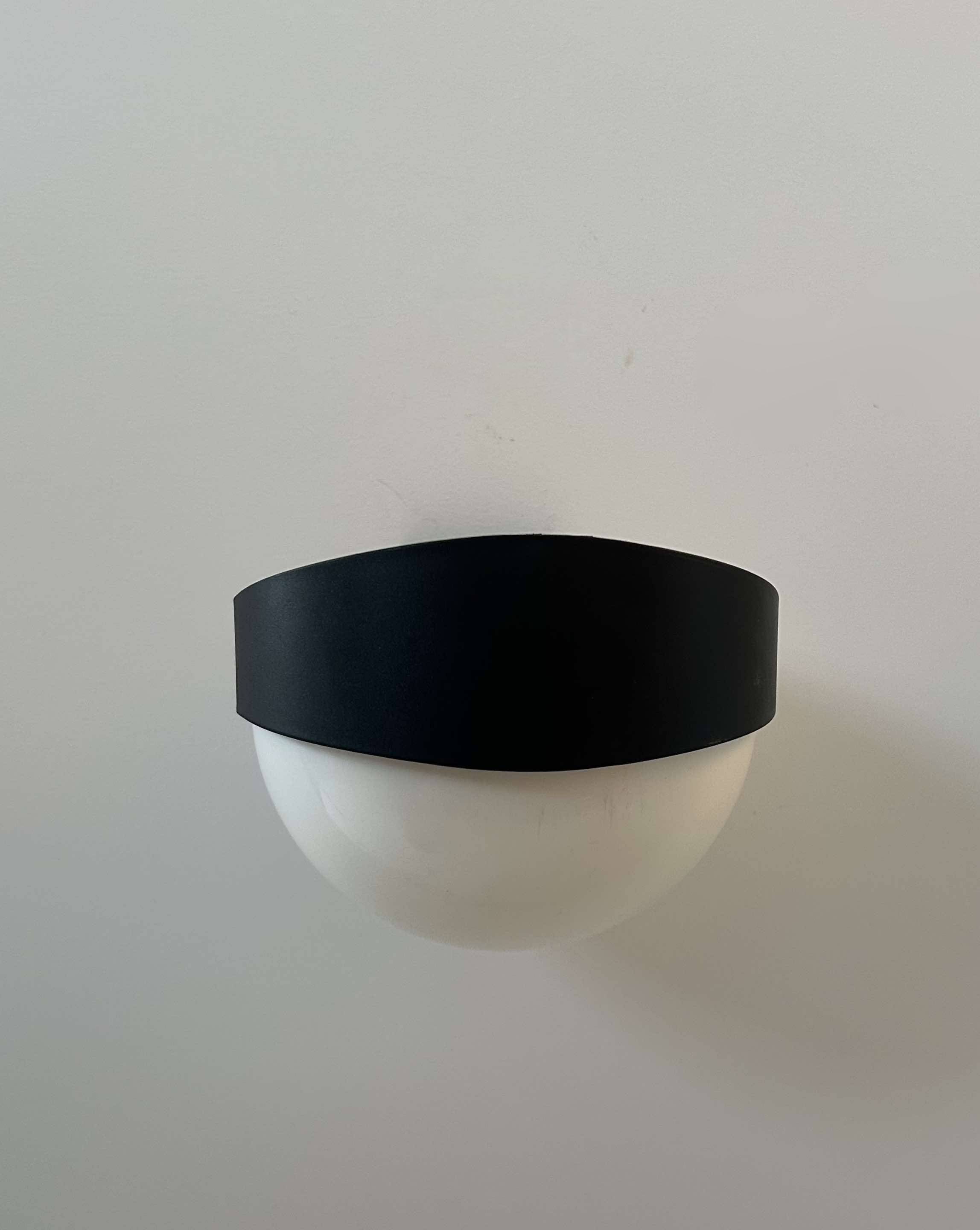 Pair of vintage wall lights, white and black Perspex, Sweden 1970