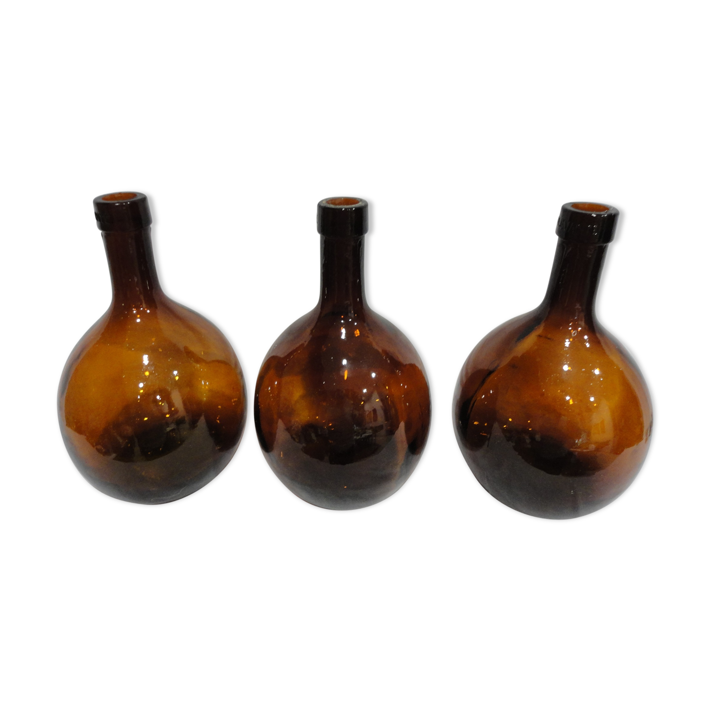 Lot 3 old round bottles