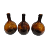 Lot 3 old round bottles