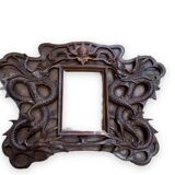 Pair of exotic wooden frames with dragons