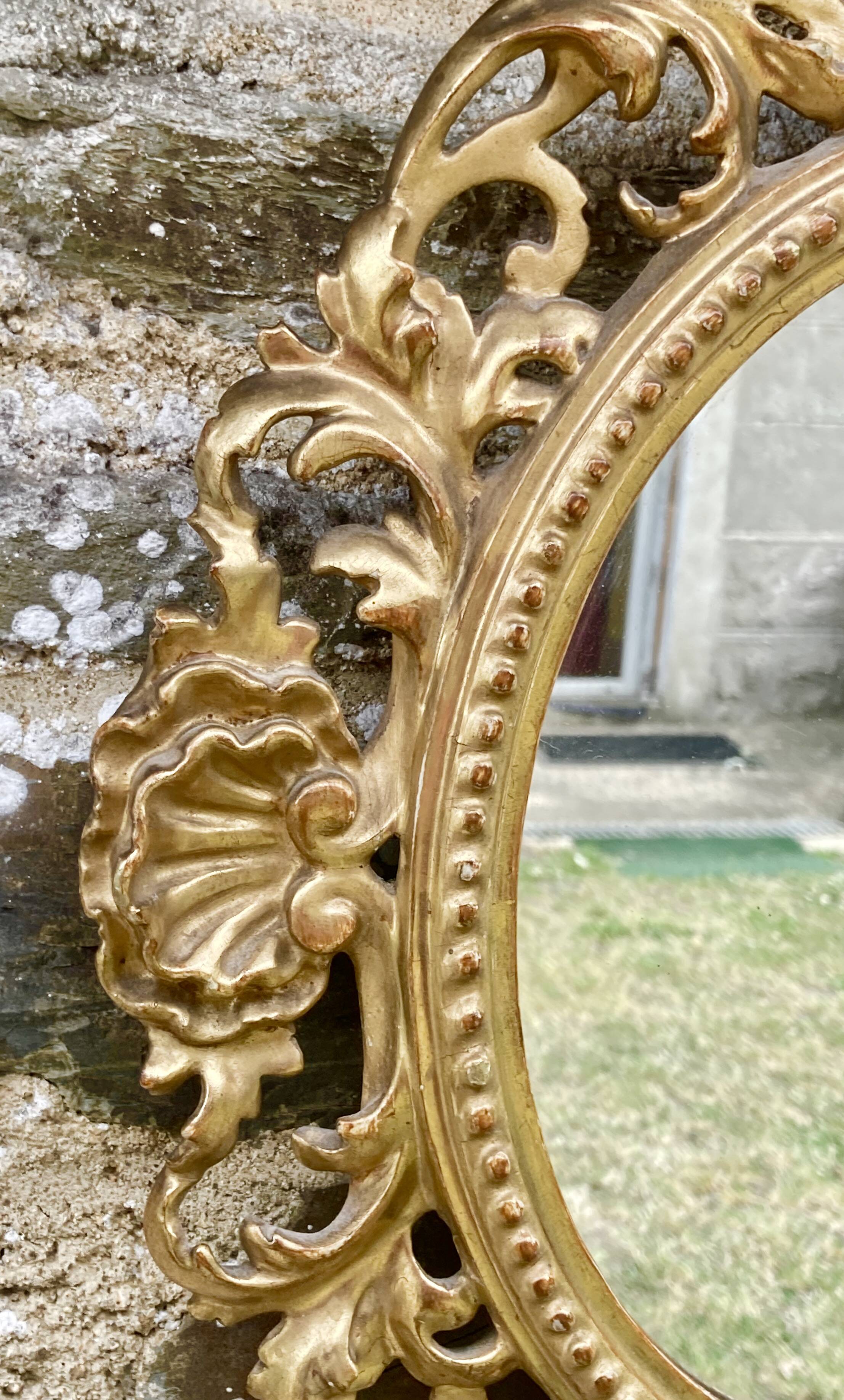 Mirror in carved wood gilded with leaf, Louis XV period, 18th century