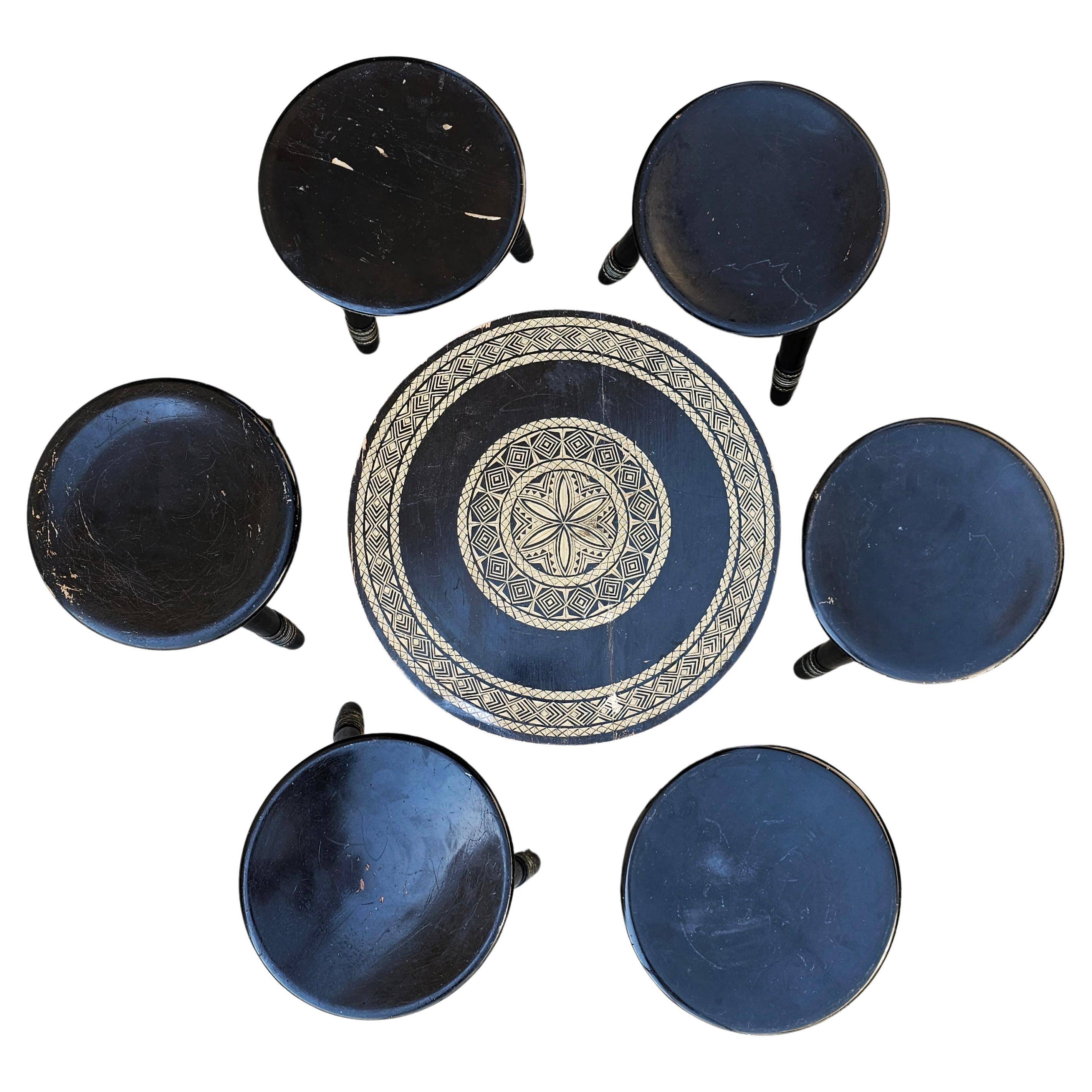 Antique hand-carved coffee table with 6 stools by Ettore Zacchari, 1900s.
