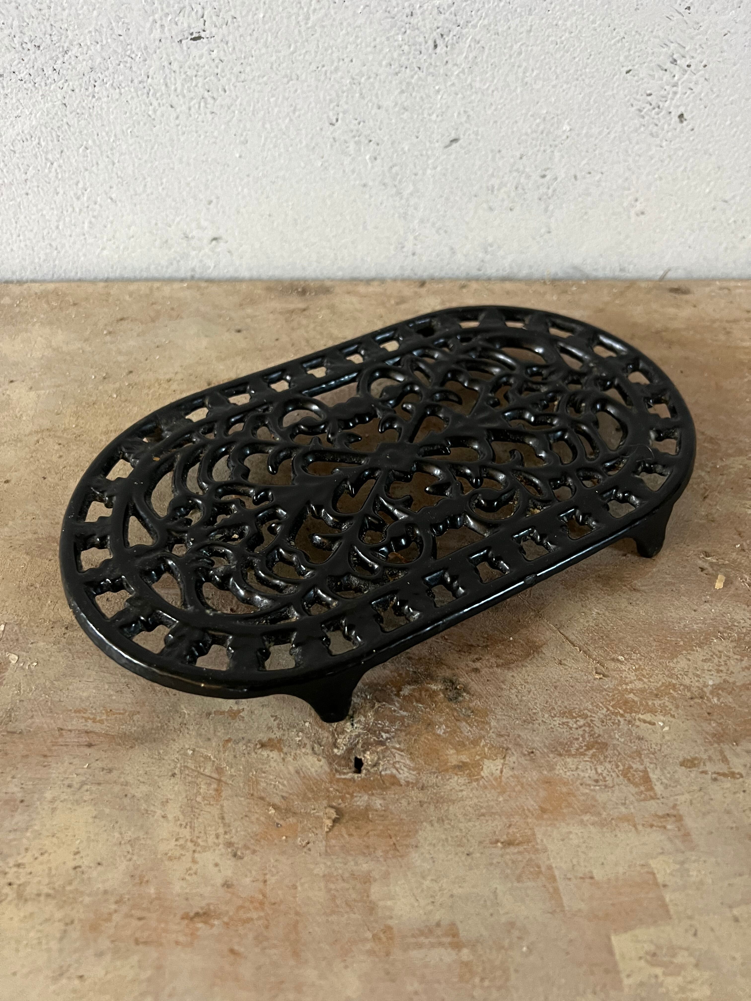 Black cast iron trivets