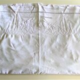 Old drapework and embroidered with 2 flowers and a butterfly