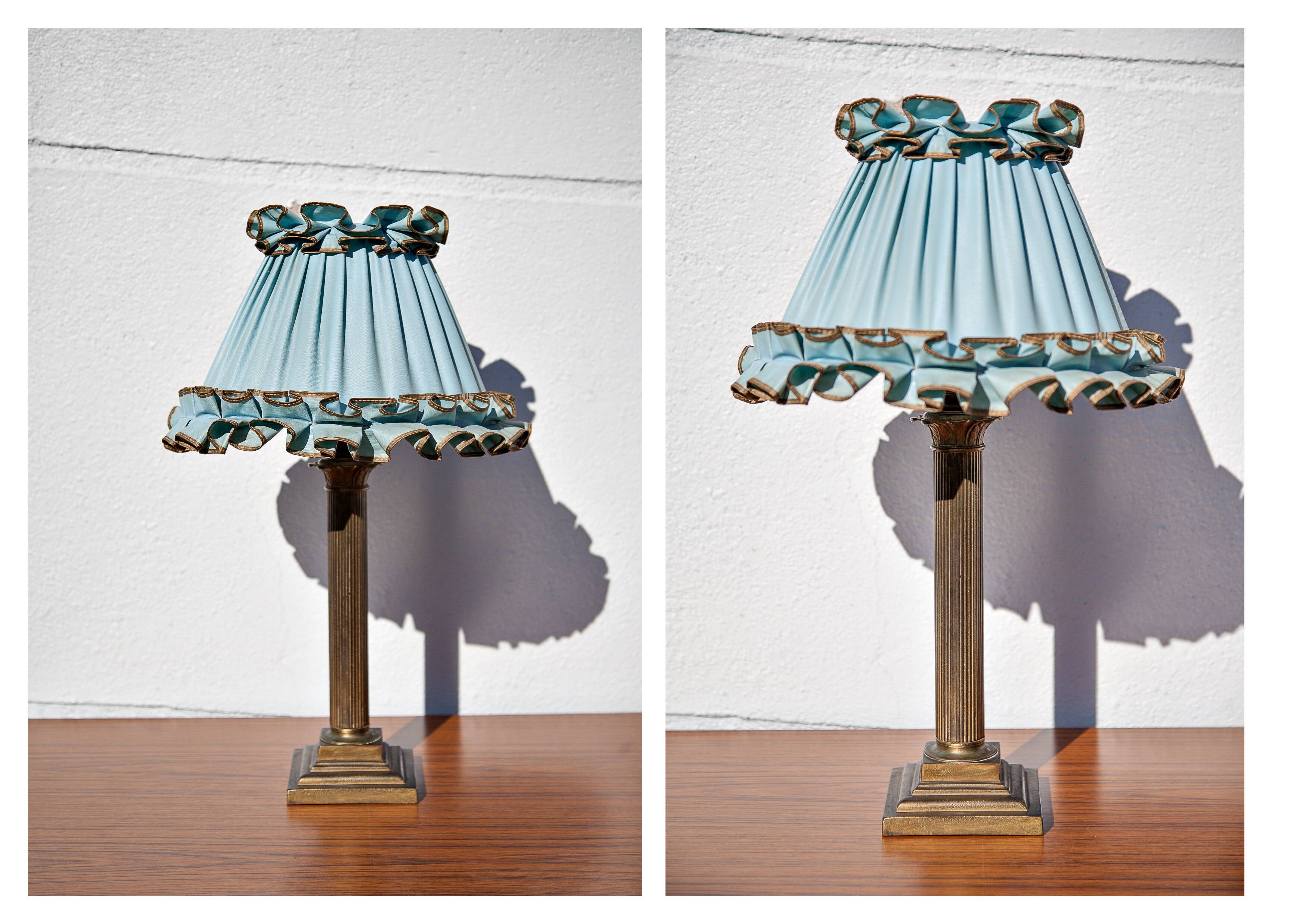 Brass lamp with vintage blue laminated lampshade