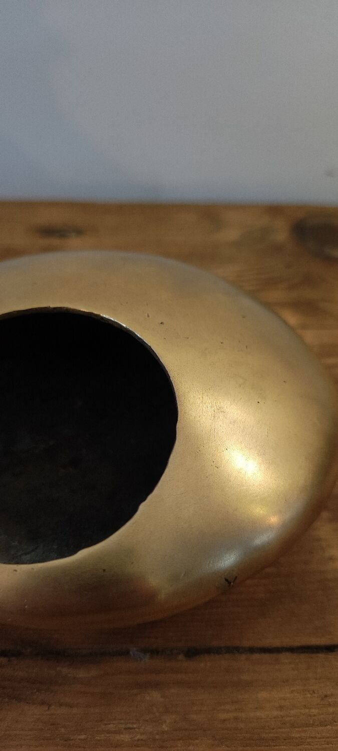 Modernist ashtray pellet in solid bronze.