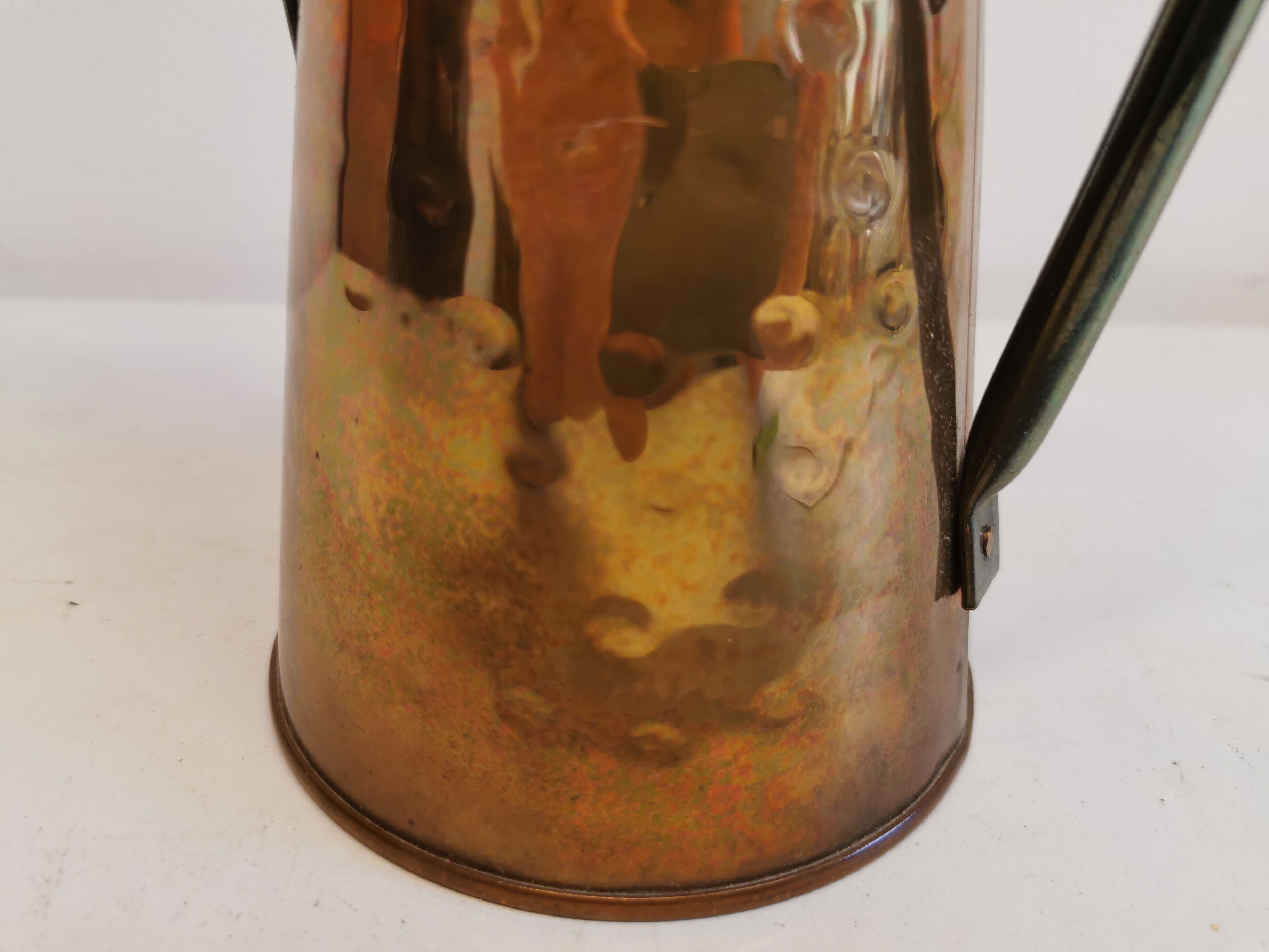 Watering can from the 1950s, made of hammered copper and brass