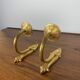 Pair of brass candle wall sconces, neoclassical style