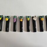 Set of 8 barbotine knife holders