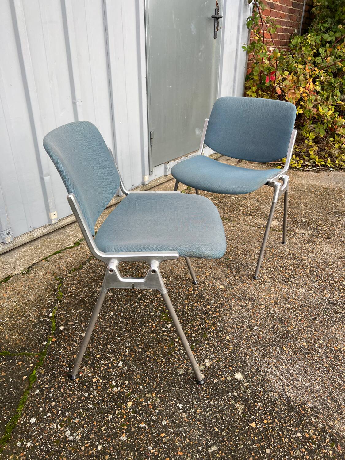 Pair of chairs by G. Piretti for Castelli