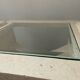 Table basse vintage en travertin et verre biseauté