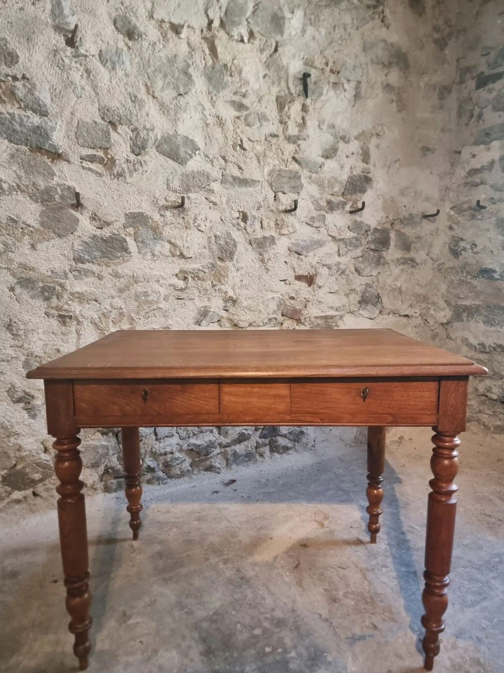 Antique French oak writing desk with 2 lockable drawers, circa 1920.