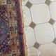 Tapis d'Orient persan ancien en laine à médaillon central
