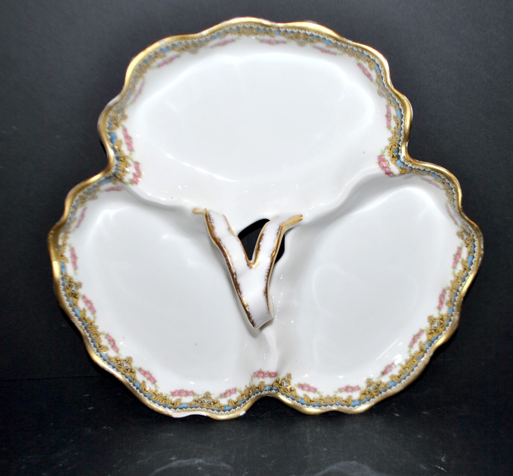 Limoges coupe mendiant polylobé en porcelaine U&C