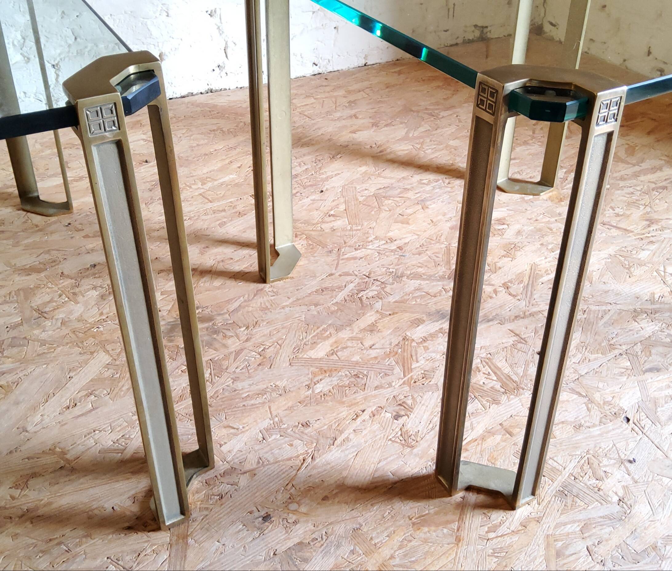Glass and brass coffee tables by Peter Ghyczy