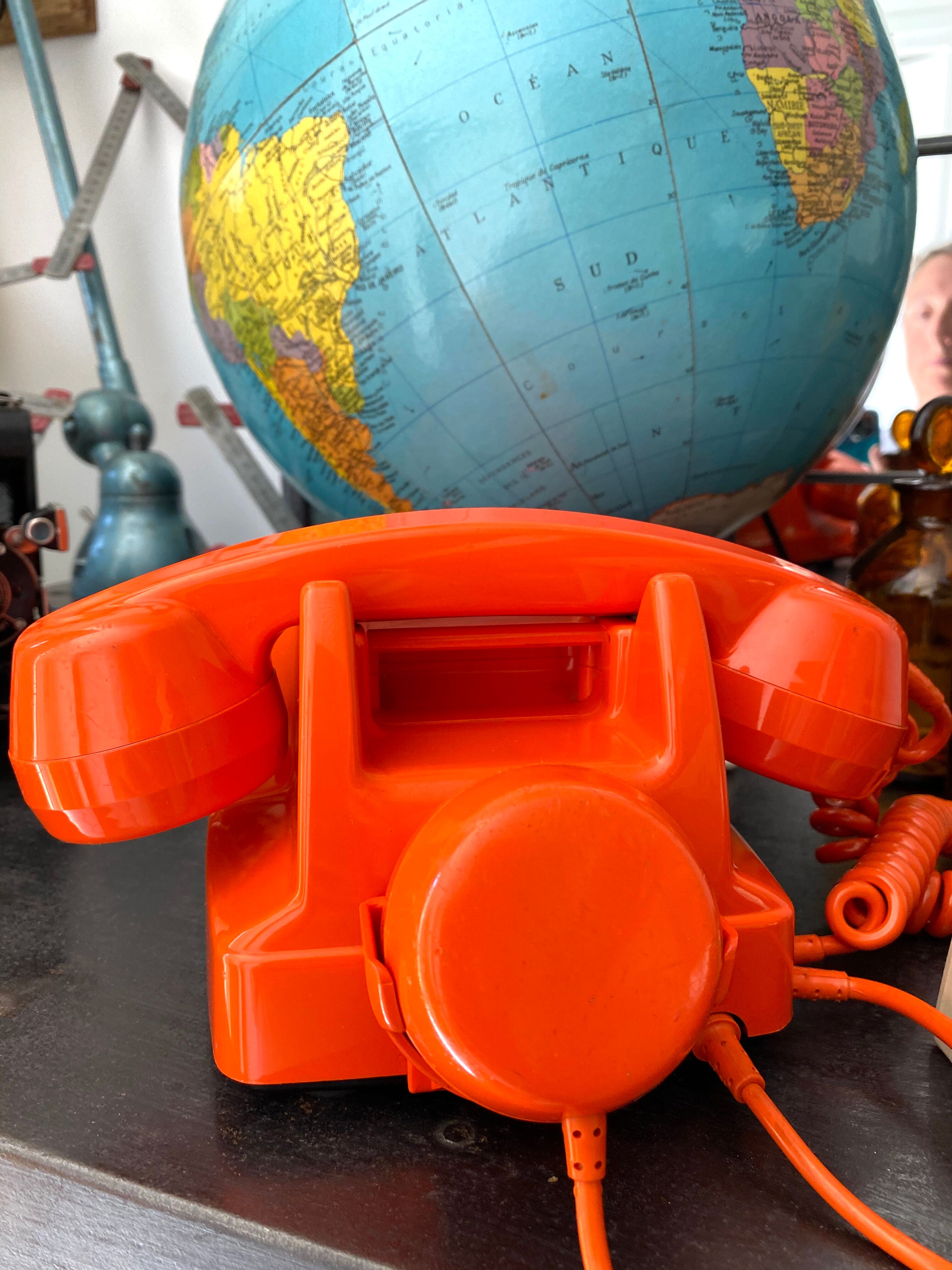 Orange vintage dial phone