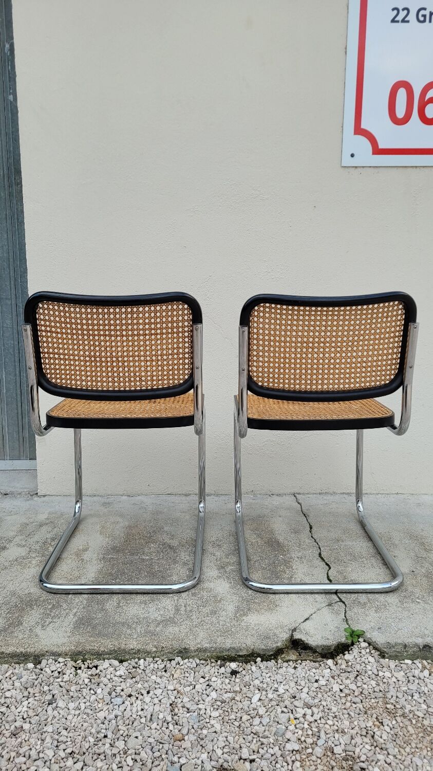 Pair of chairs by Marcel Breuer in black canework model B32 signed Italy