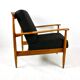 Black boucle chair, Danish design on the cushions, 1970s.