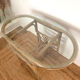 Small oval dining table in rattan "Double Gerbe" – Duo Rivie format