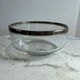 Glass and silver-plated metal salad bowl, silver rim.
