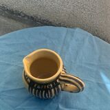 Vintage prince henry enamelled ceramic pitcher