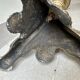 Gilded bronze candlestick with cherub trio decoration