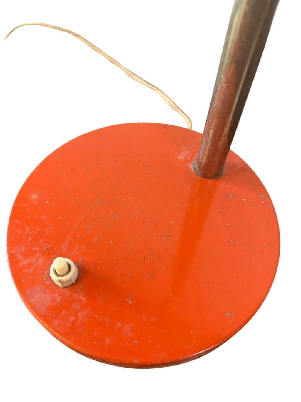 Vintage orange desk lamp with chrome accents.
