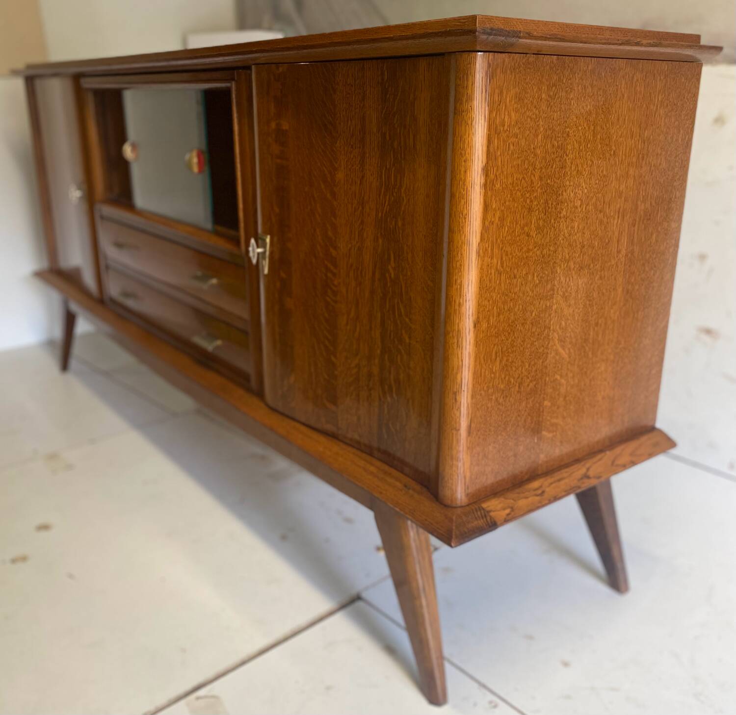 Oak sideboard with compass legs