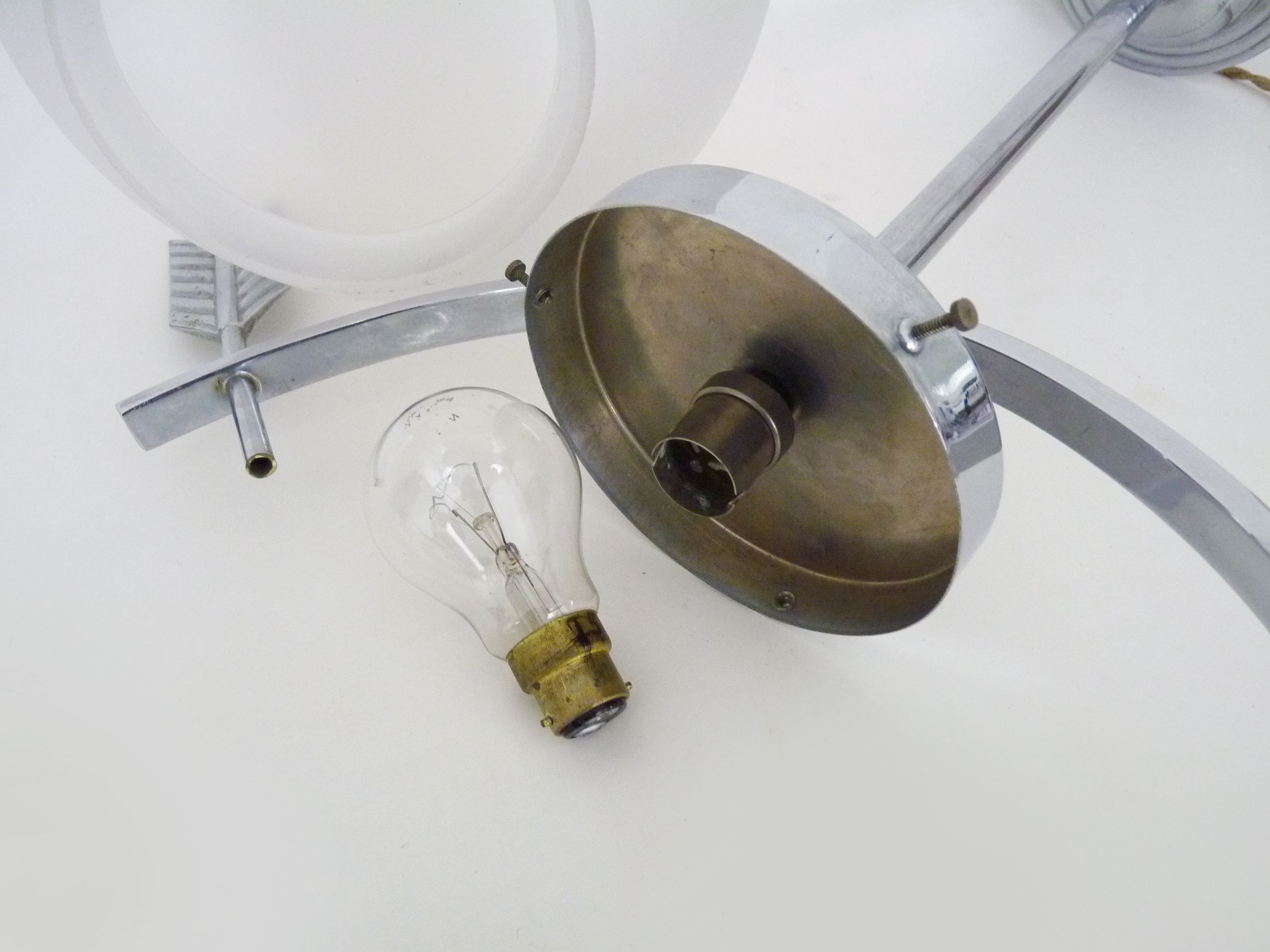 Suspension in chromed metal and glass, space age, arrow crossing a globe. Seventies