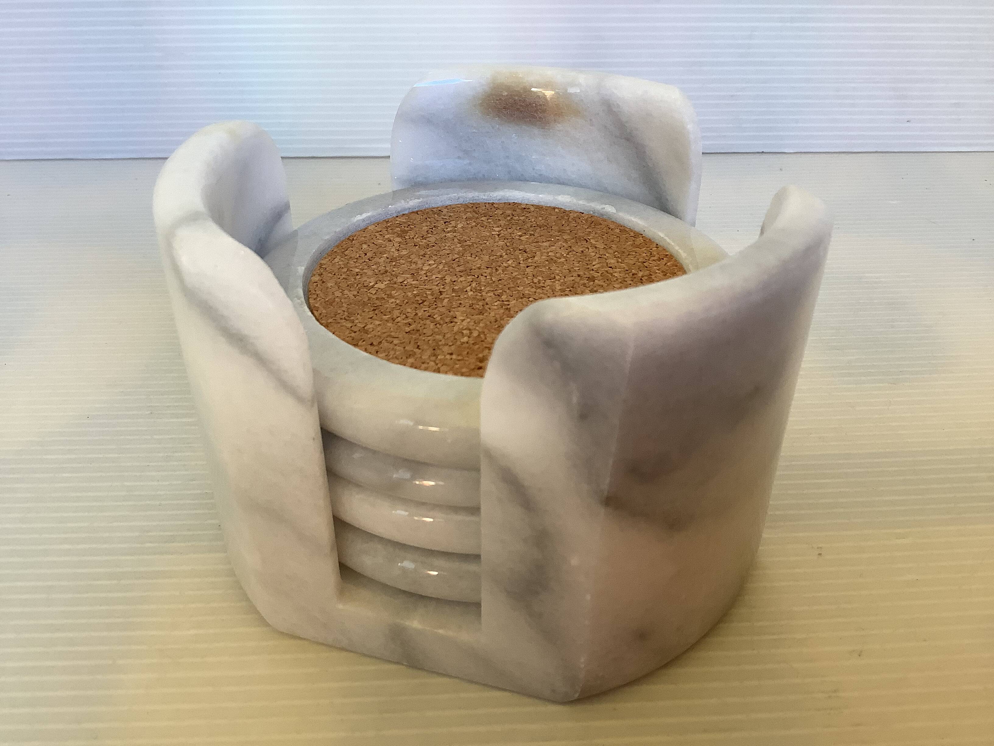 Four marble coasters with holder