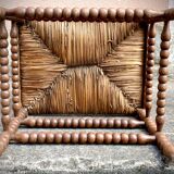 Antique Bobbin armchair with straw seat