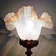 Table lamp in gilded bronze with opalescent glass shade, early 20th century.