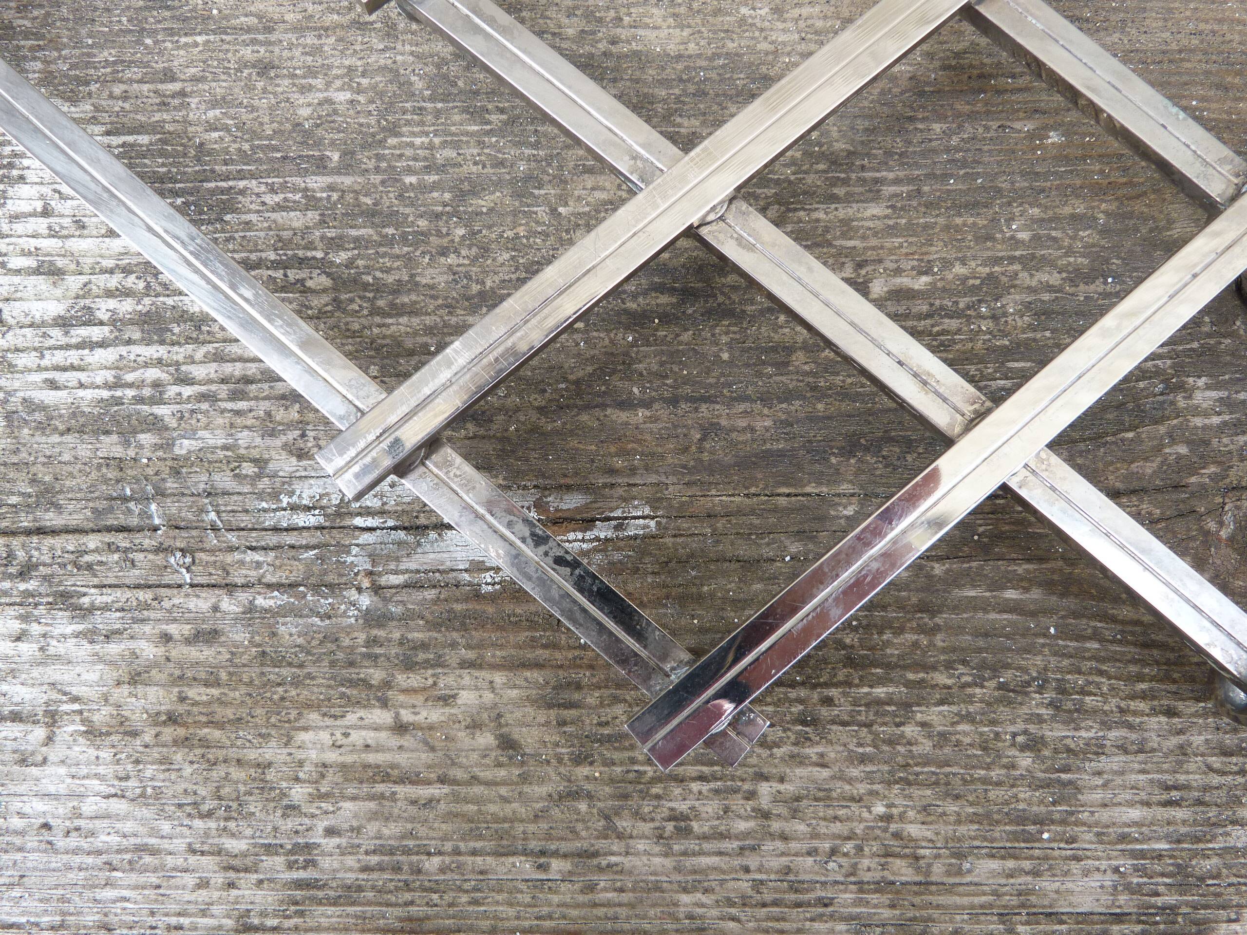 Modernist design foldable trivet in silver metal Jacques Adnet 1940/1950