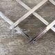 Modernist design foldable trivet in silver metal Jacques Adnet 1940/1950