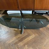 70s design oval coffee table in smoked black glass with chrome legs.
