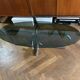 Table basse design ovale années 70 en verre fumé noir et pieds chromé