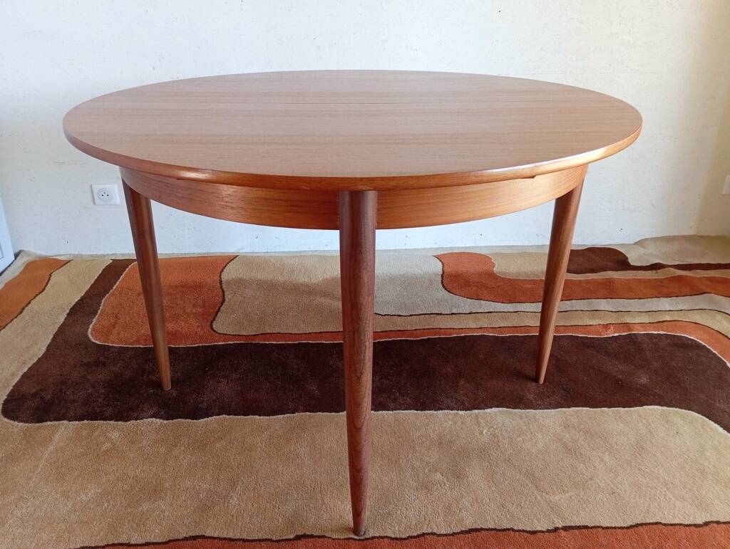 Scandinavian round extendable teak table