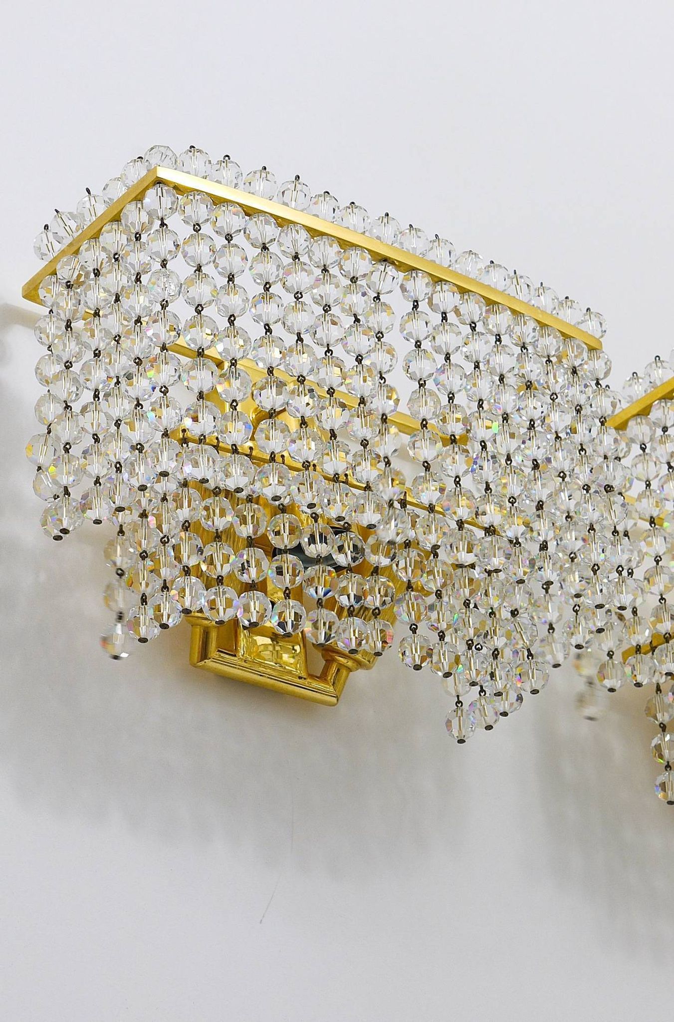 Pair of square wall sconces in gilded brass with hand-cut crystals, 1970s.
