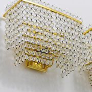 Pair of square wall sconces in gilded brass with hand-cut crystals, 1970s.
