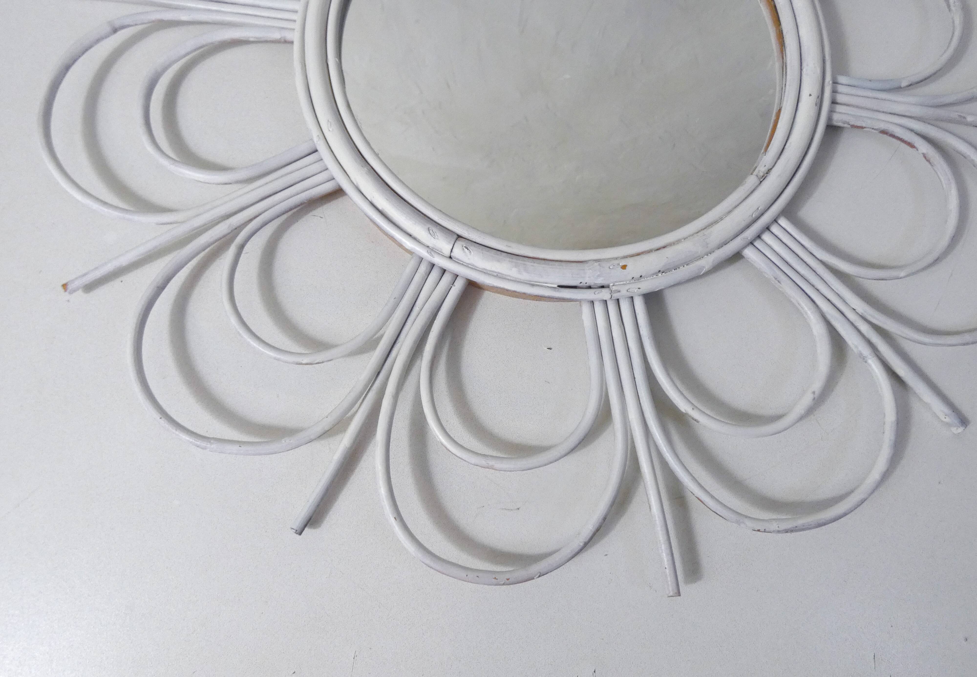 Vintage rattan sun mirror