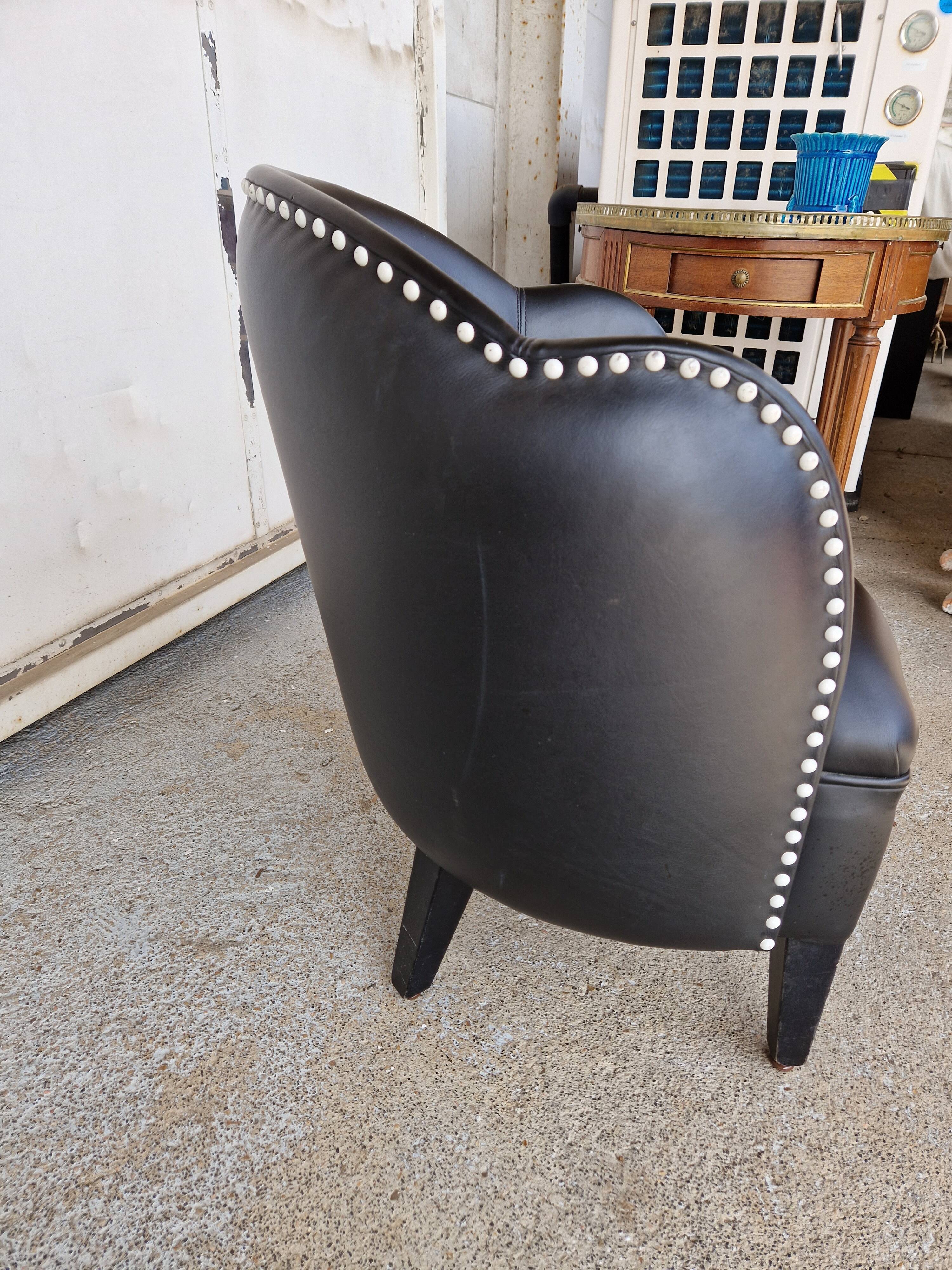 Pair of armchairs in imitation leather