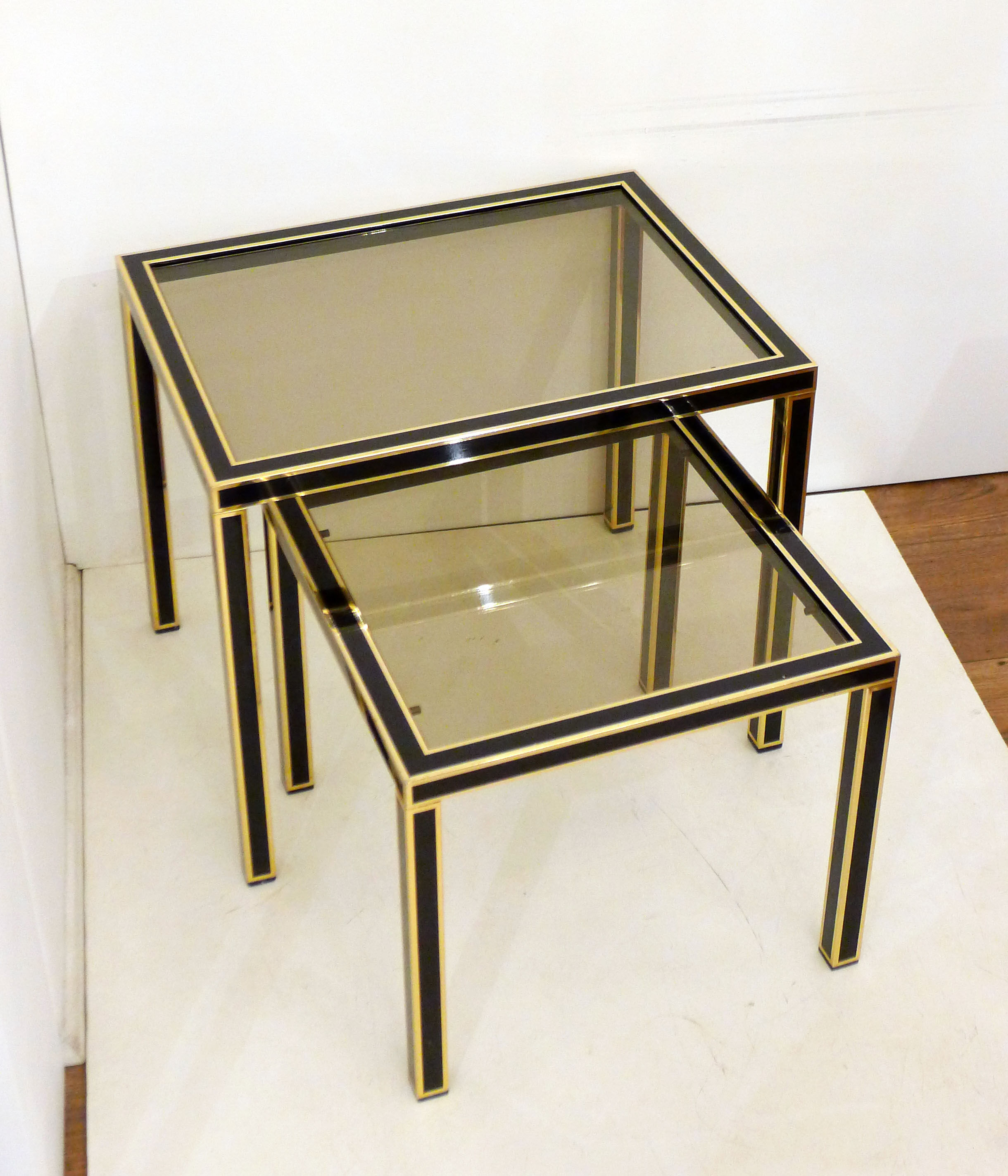 Pair of black & gold trundle tables 1970'