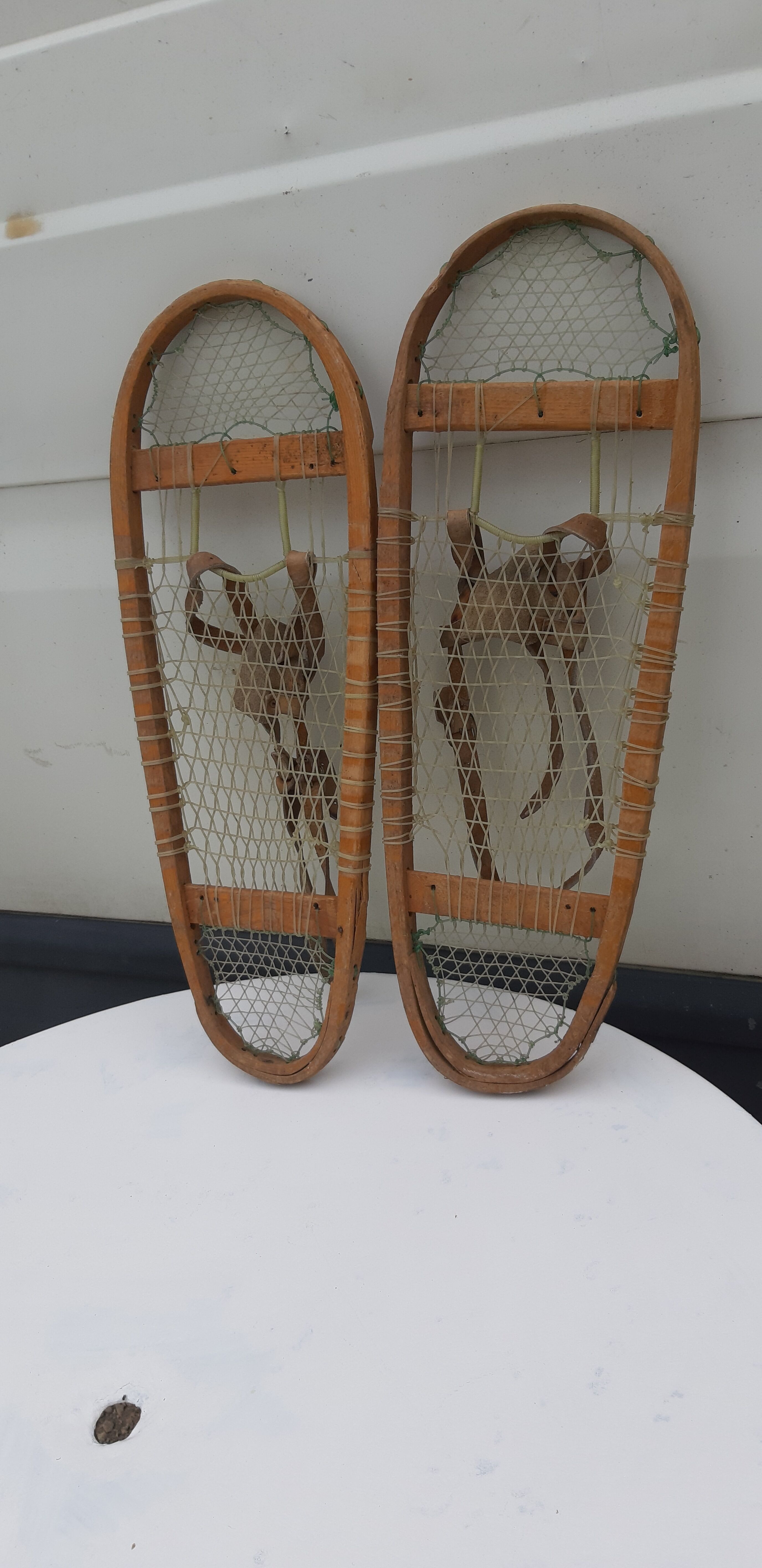 Old snowshoes made of wood and hoses