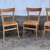 Series of 4 chairs in vintage light wood beech