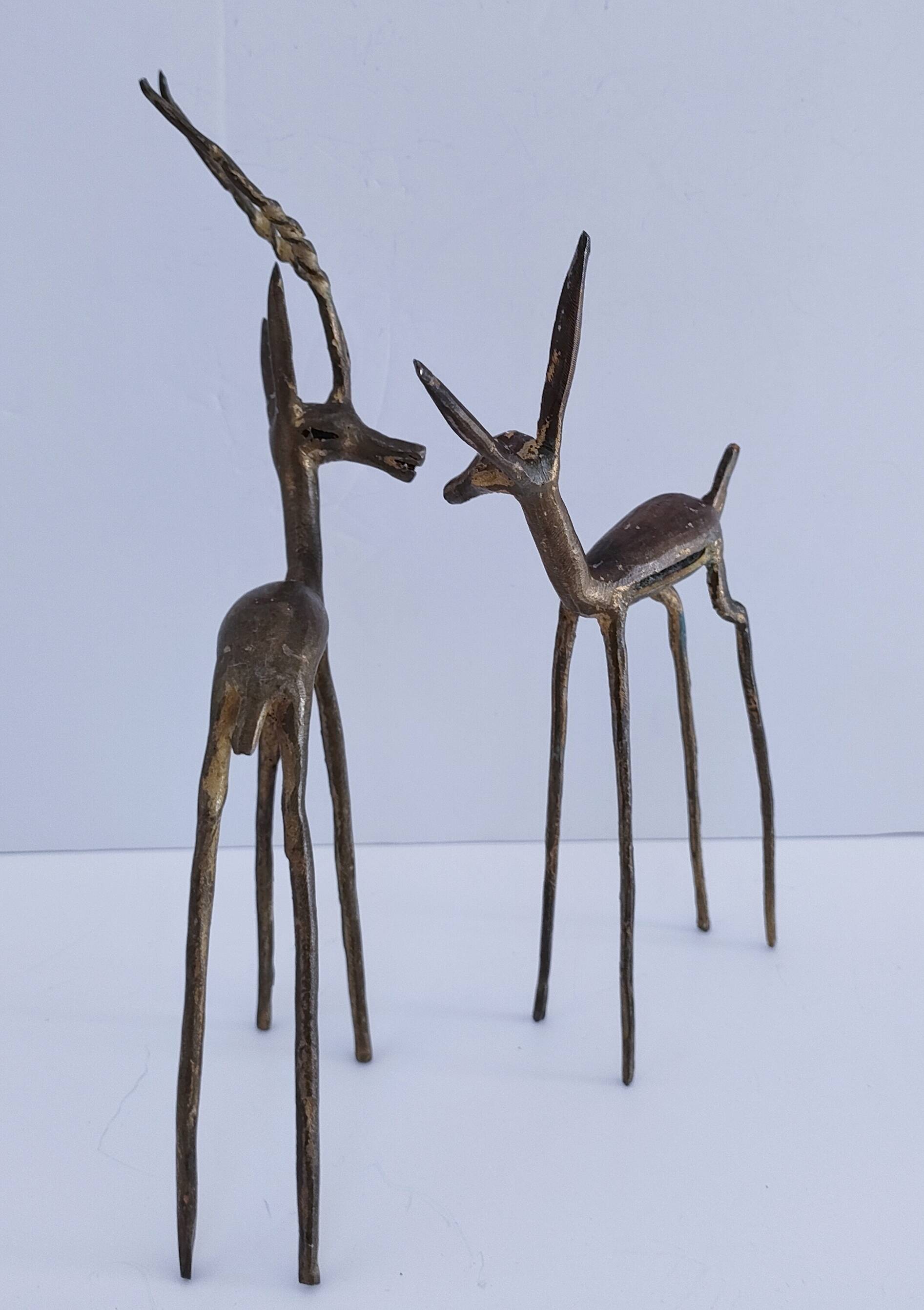 four vintage brass gazelle antelope sculptures