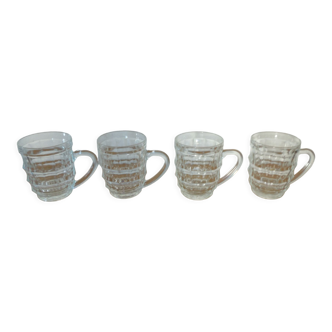 4 transparent glass mugs