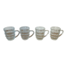 4 transparent glass mugs