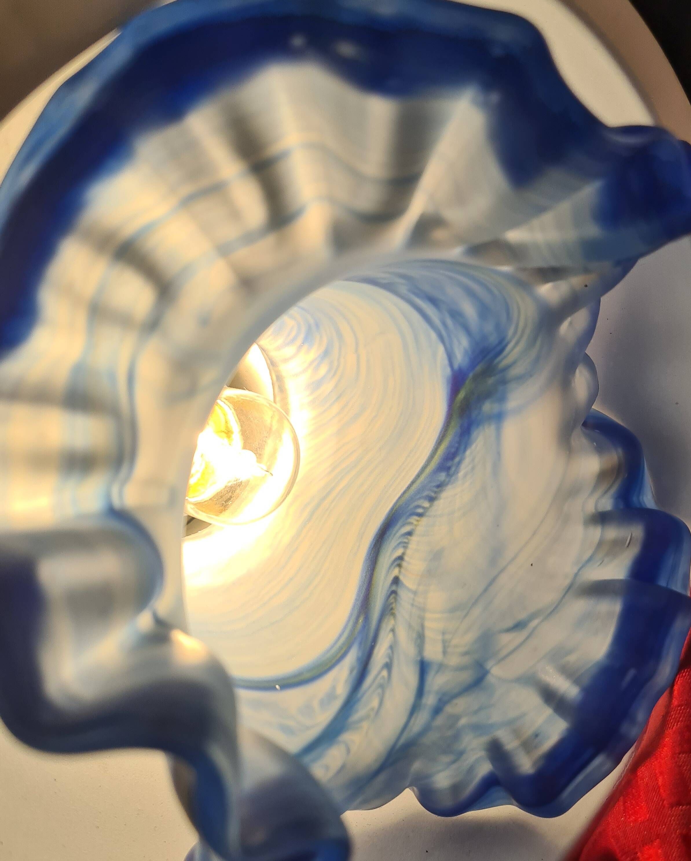 etched brass lamp with a blue satin glass tulip shade, signed Vianne 36x16